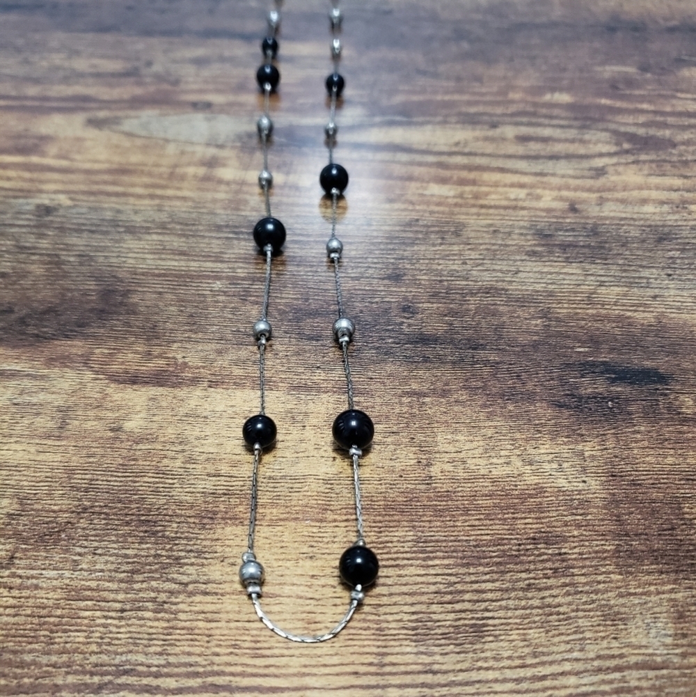 silver tone long necklace with black beads